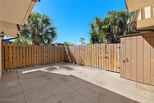 view of patio / terrace featuring fence