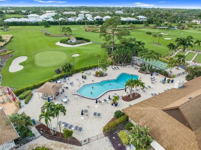 birds eye view of property featuring golf course view