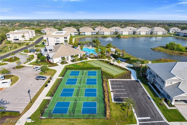 birds eye view of property with a residential view and a water view