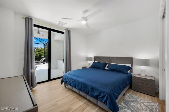 bedroom with light wood-type flooring, visible vents, access to exterior, and a ceiling fan