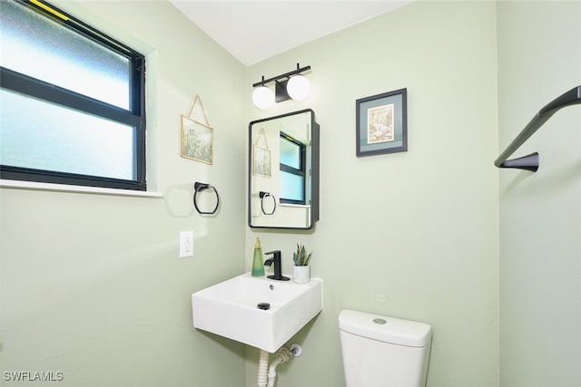 bathroom featuring a sink and toilet