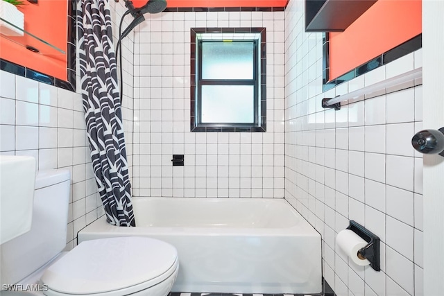 full bathroom featuring shower / bath combination with curtain, toilet, and tile walls