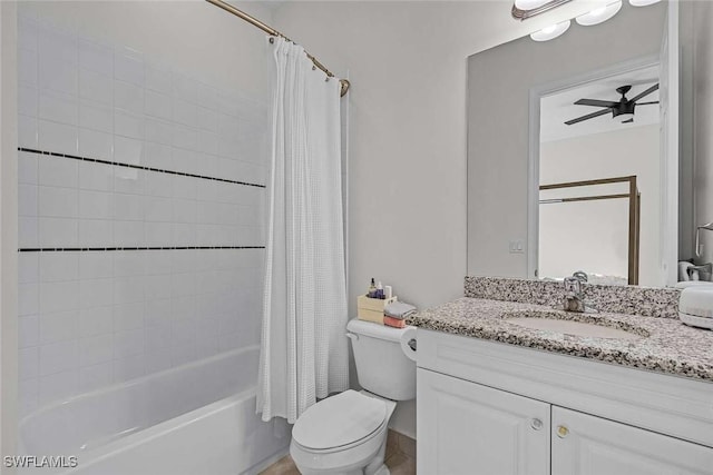 bathroom with shower / bathtub combination with curtain, vanity, toilet, and a ceiling fan