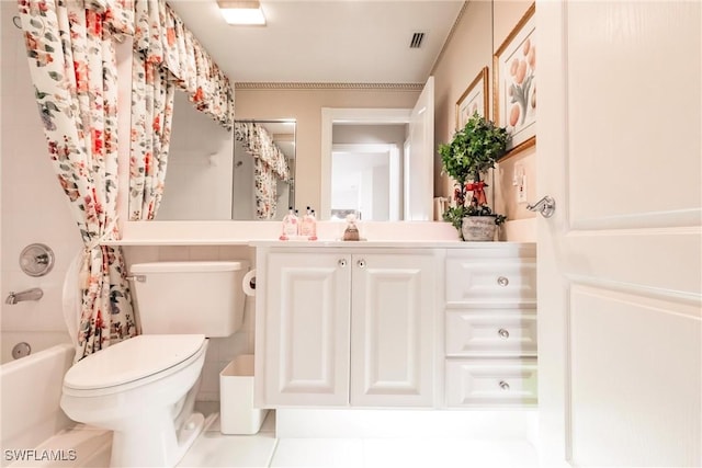 bathroom with visible vents, vanity, toilet, and shower / bath combo with shower curtain