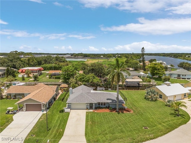 bird's eye view with a residential view and a water view