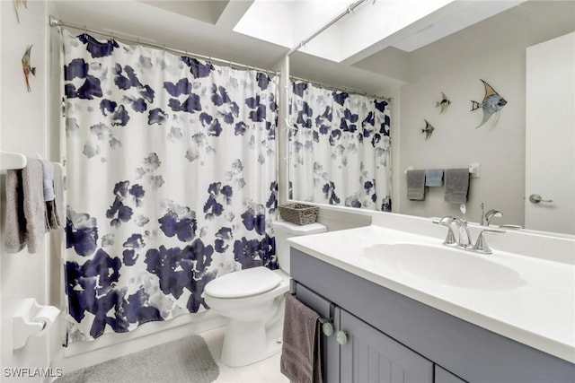 full bath featuring curtained shower, toilet, and vanity