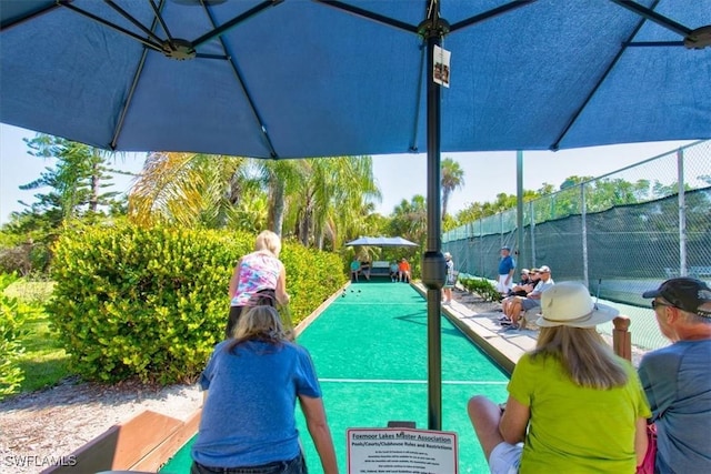 view of pool with fence