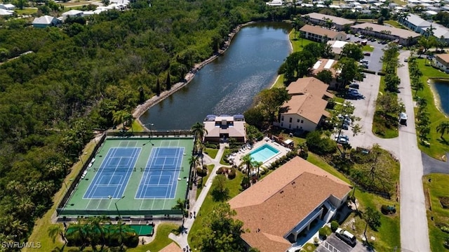 birds eye view of property featuring a water view