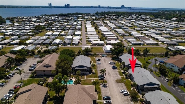 aerial view featuring a residential view and a water view