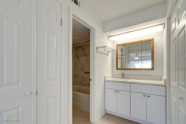 full bathroom featuring visible vents, bathing tub / shower combination, vanity, and tile patterned flooring