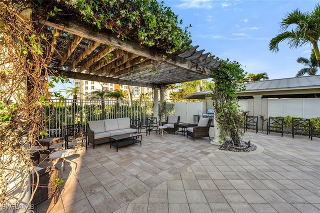 view of patio / terrace with fence, outdoor lounge area, and a pergola