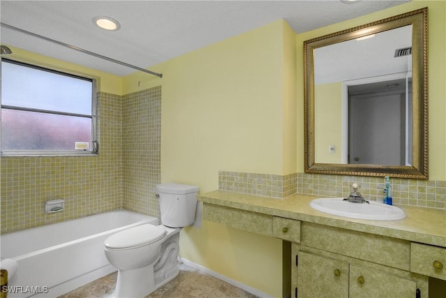 bathroom featuring vanity, visible vents,  shower combination, decorative backsplash, and toilet