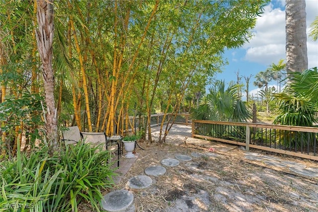 view of patio / terrace featuring fence