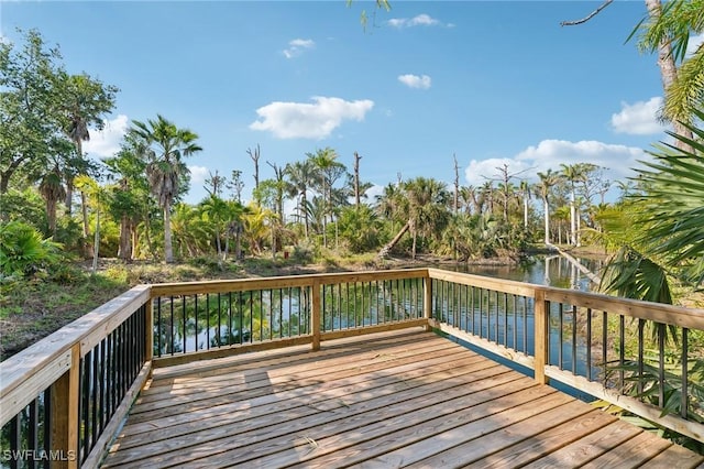 deck featuring a water view