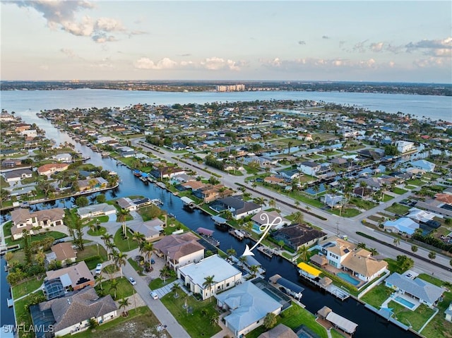 836 Miramar Ct, Cape Coral, FL 33904 - birds eye view of property featuring a residential view and a water view