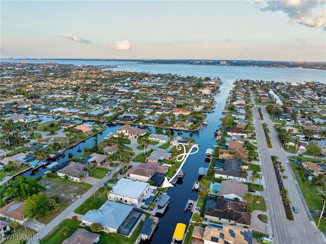 836 Miramar Ct, Cape Coral, FL 33904 - birds eye view of property with a residential view and a water view