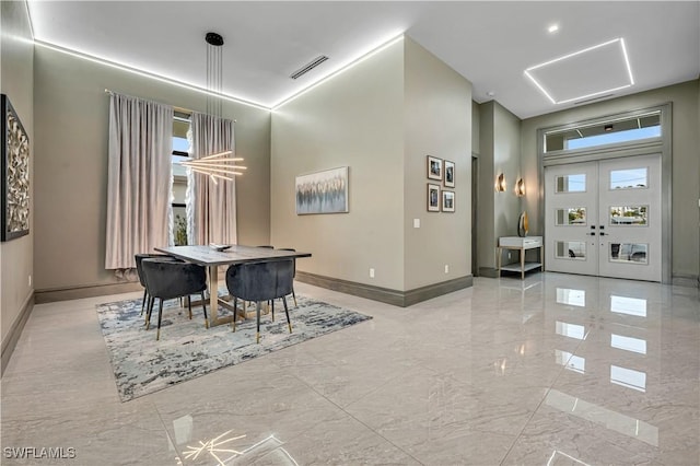 836 Miramar Ct, Cape Coral, FL 33904 - dining space featuring baseboards, visible vents, and marble finish floor
