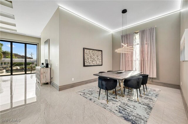 836 Miramar Ct, Cape Coral, FL 33904 - dining space with baseboards