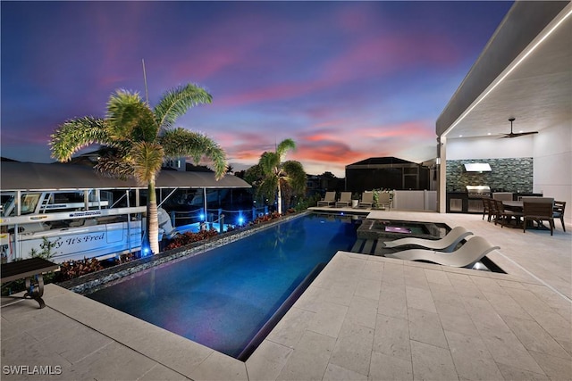 836 Miramar Ct, Cape Coral, FL 33904 - view of swimming pool with a pool with connected hot tub, outdoor dining area, and a patio