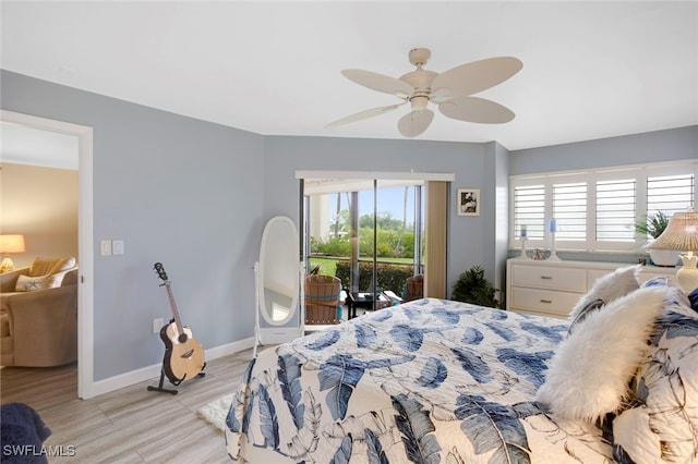 bedroom with light wood finished floors, baseboards, ceiling fan, and access to outside