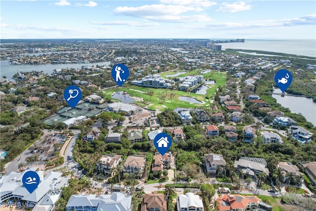 bird's eye view with a residential view and a water view