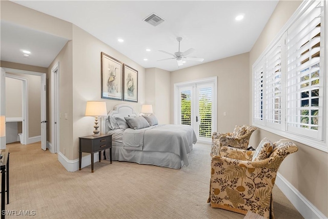 bedroom featuring access to outside, light colored carpet, visible vents, and baseboards