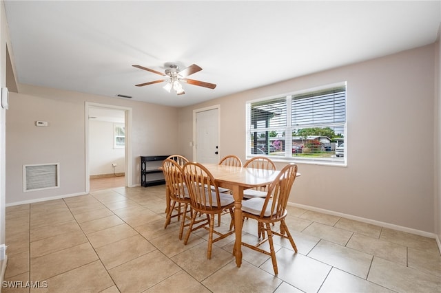 2184 Barry Dr, Fort Myers, FL 33907 - dining area featuring ceiling fan, visible vents, baseboards, and light tile patterned flooring