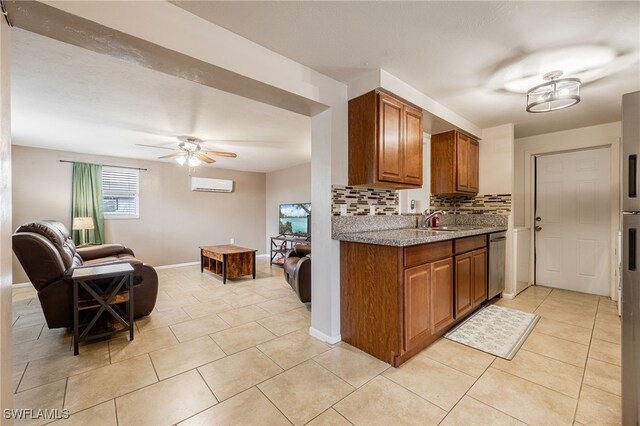 2184 Barry Dr, Fort Myers, FL 33907 - kitchen featuring a sink, tasteful backsplash, stainless steel dishwasher, a wall unit AC, and brown cabinetry