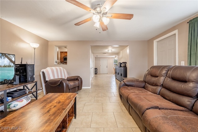 2184 Barry Dr, Fort Myers, FL 33907 - living area with light tile patterned floors and a ceiling fan