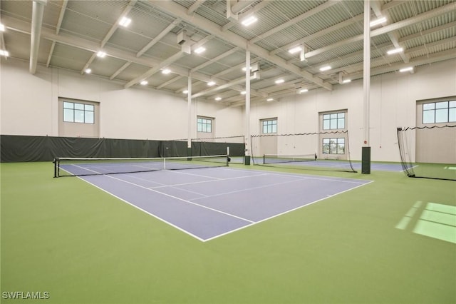 view of tennis court with community basketball court