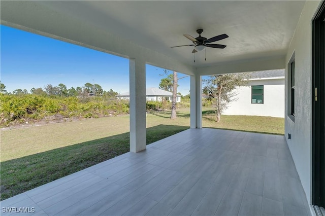 view of patio with ceiling fan