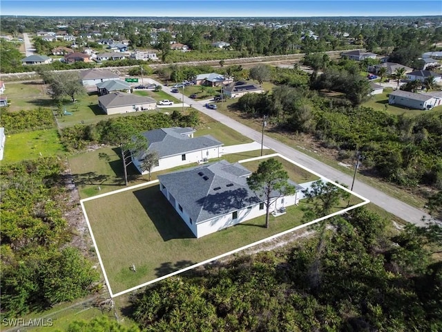 drone / aerial view with a residential view