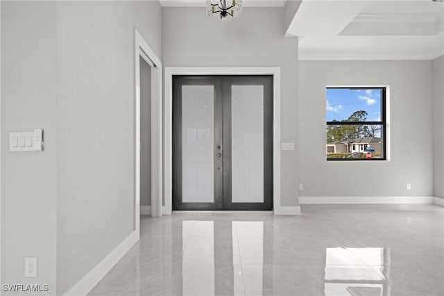 foyer entrance with french doors, baseboards, and marble finish floor