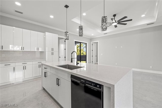 kitchen with visible vents, ornamental molding, a sink, a tray ceiling, and dishwasher