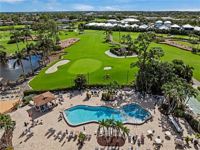 birds eye view of property with view of golf course