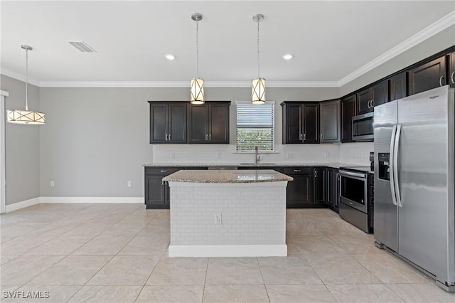 kitchen with light stone counters, ornamental molding, stainless steel appliances, and a sink