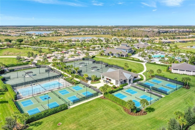 bird's eye view with a residential view and a water view