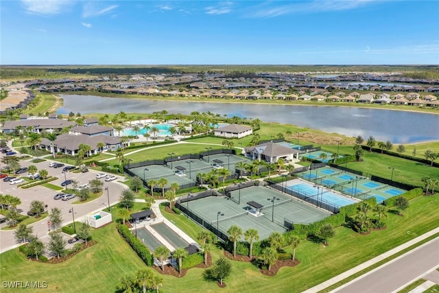 aerial view with a water view and a residential view