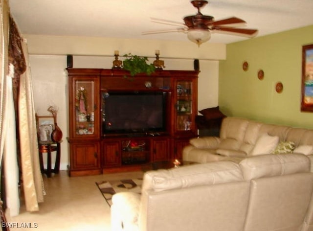 living room featuring a ceiling fan