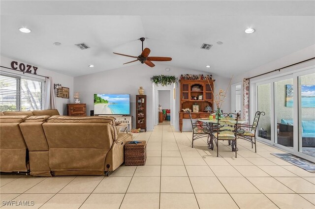 3319 Surfside Blvd, Cape Coral, FL 33914 - living room featuring light tile patterned floors, visible vents, and vaulted ceiling
