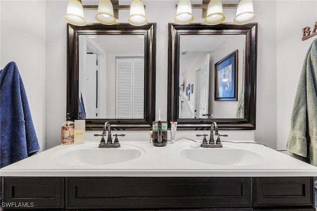 3319 Surfside Blvd, Cape Coral, FL 33914 - bathroom with double vanity and a sink