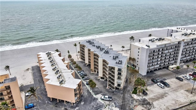 drone / aerial view with a view of the beach and a water view