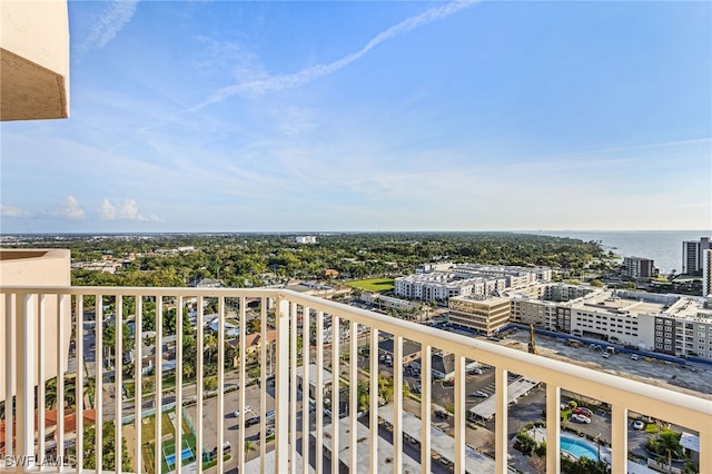 balcony with a city view and a water view