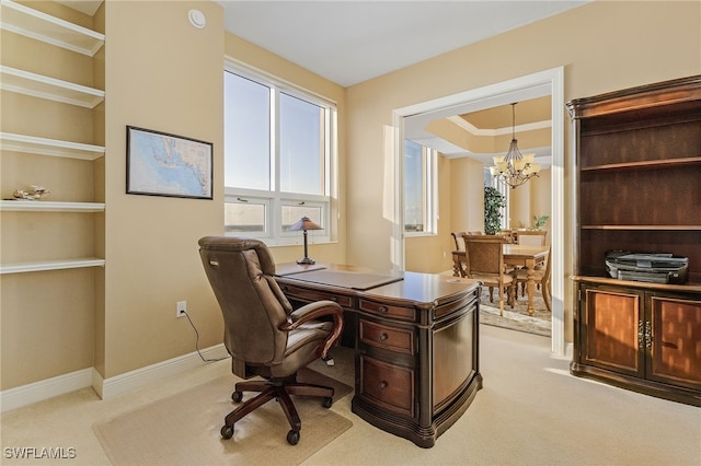 office with baseboards, a raised ceiling, an inviting chandelier, and carpet flooring