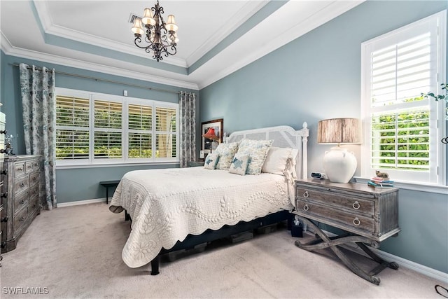 6849 Il Regalo Cir, Naples, FL 34109 - carpeted bedroom featuring an inviting chandelier, a tray ceiling, crown molding, and baseboards