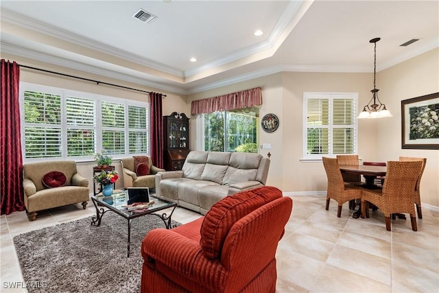 6849 Il Regalo Cir, Naples, FL 34109 - living room featuring baseboards, visible vents, and ornamental molding