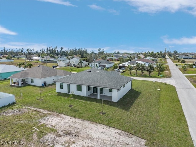 drone / aerial view with a residential view