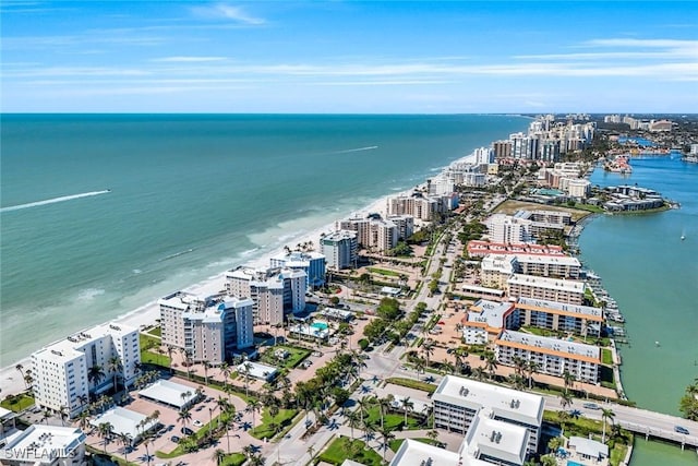 birds eye view of property featuring a view of city and a water view