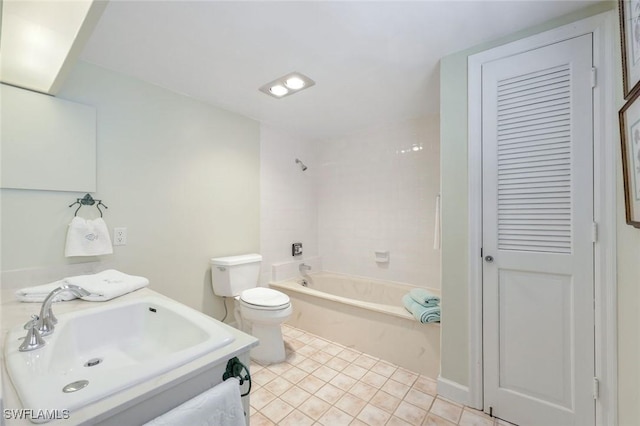 full bathroom with tile patterned flooring, toilet, vanity, and  shower combination