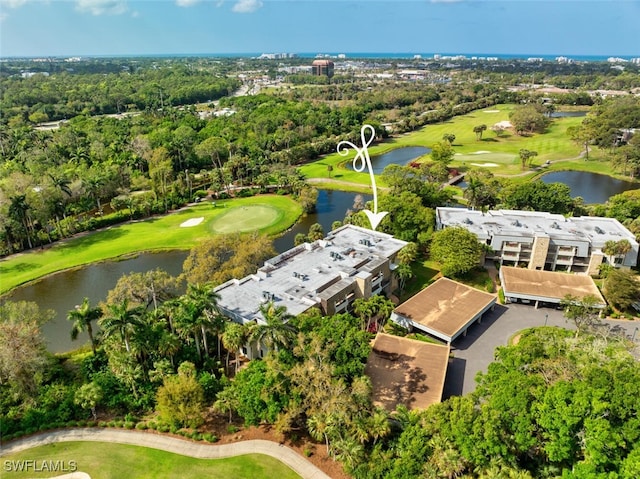 aerial view featuring a water view and view of golf course